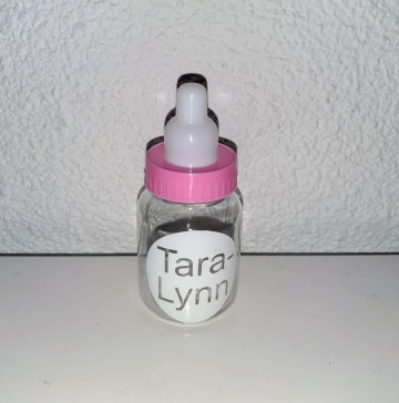 Roze fles met naam 0